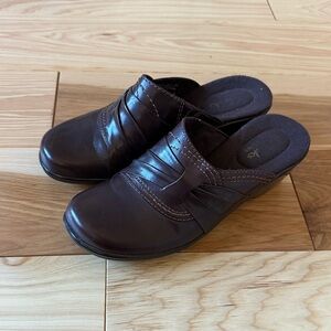 Brown leather clogs